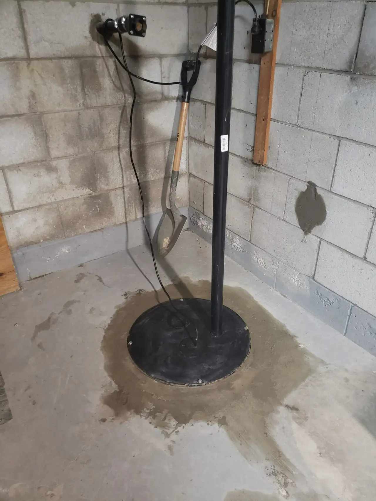 Sump pump system with interior drainage feeding the pit, installed by the AVH Foundations family
